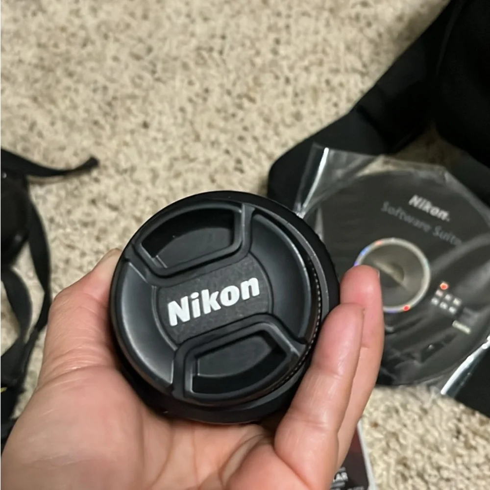 Nikon D5000 DSLR Camera with 18-22 mm lens & 1 battery, bag, and more
